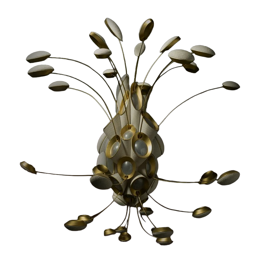 Photograph of an architectural model: thirty pod-like discs on slender brass armatures splaying outward from a textured central capsule.